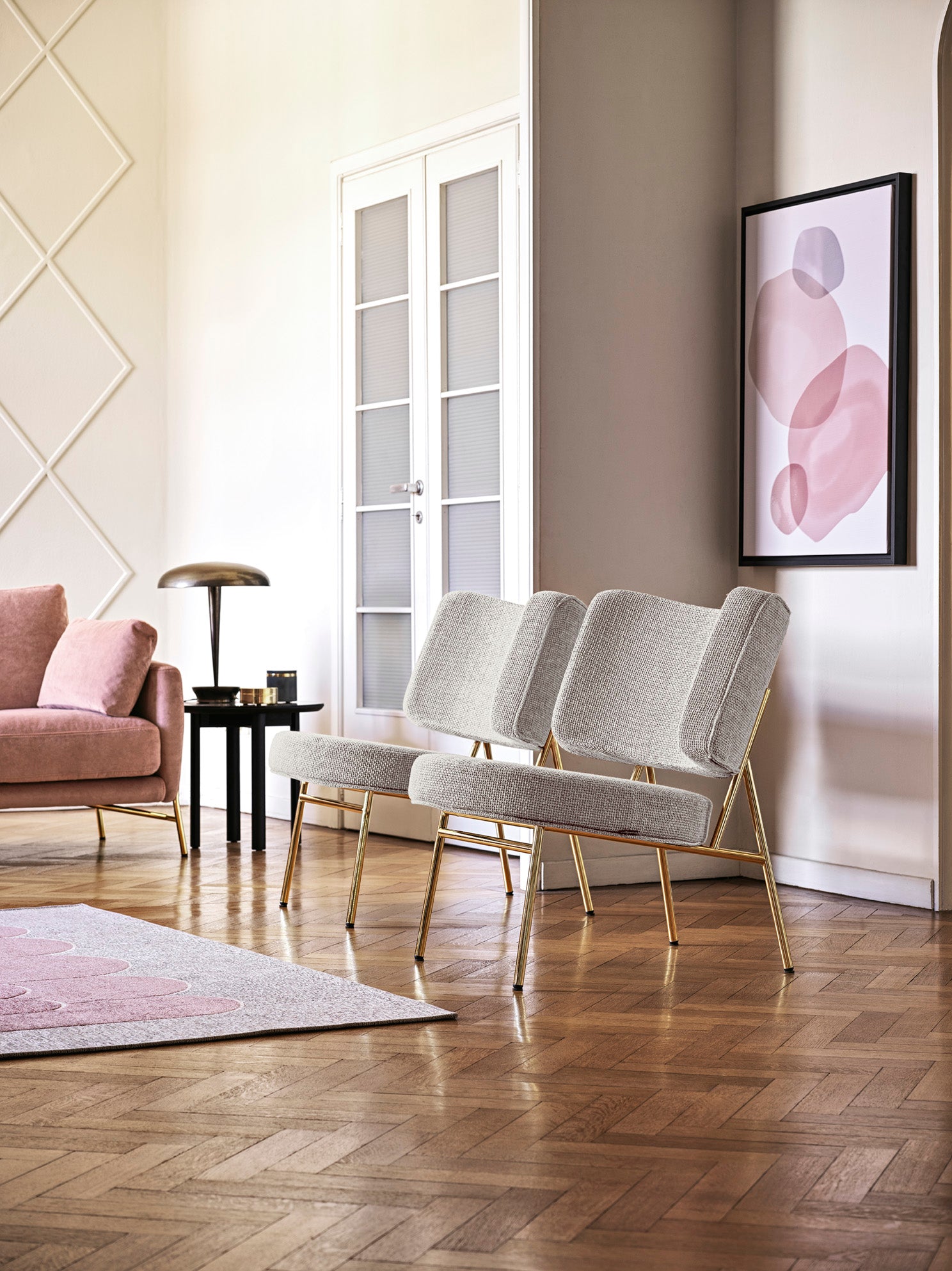 Gevoerde COCO fauteuil met zwarte basis