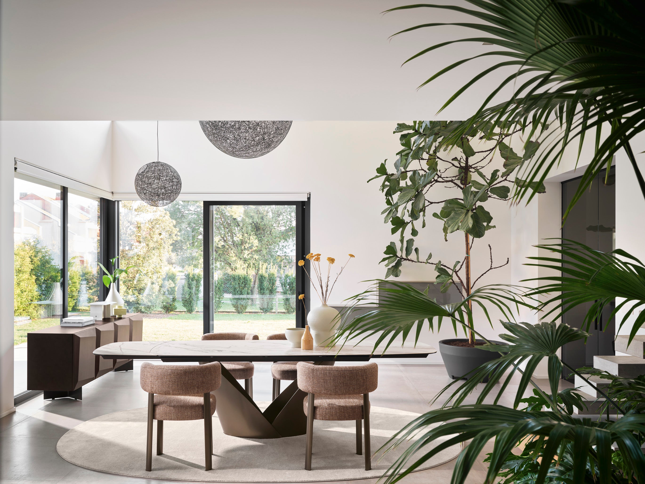 Upholstered GLEN chair with a brown base