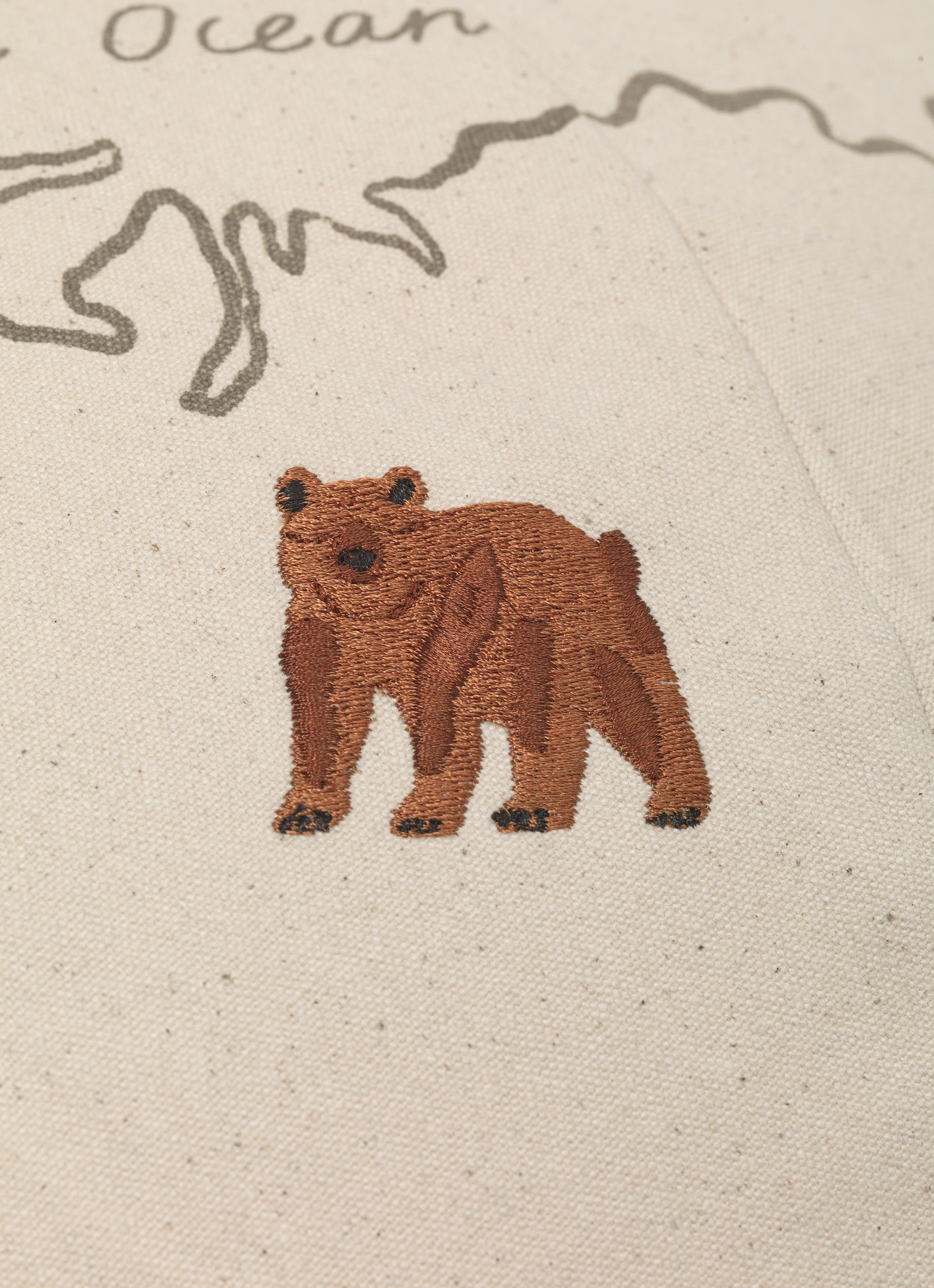 Puf DE WERELD gebroken wit