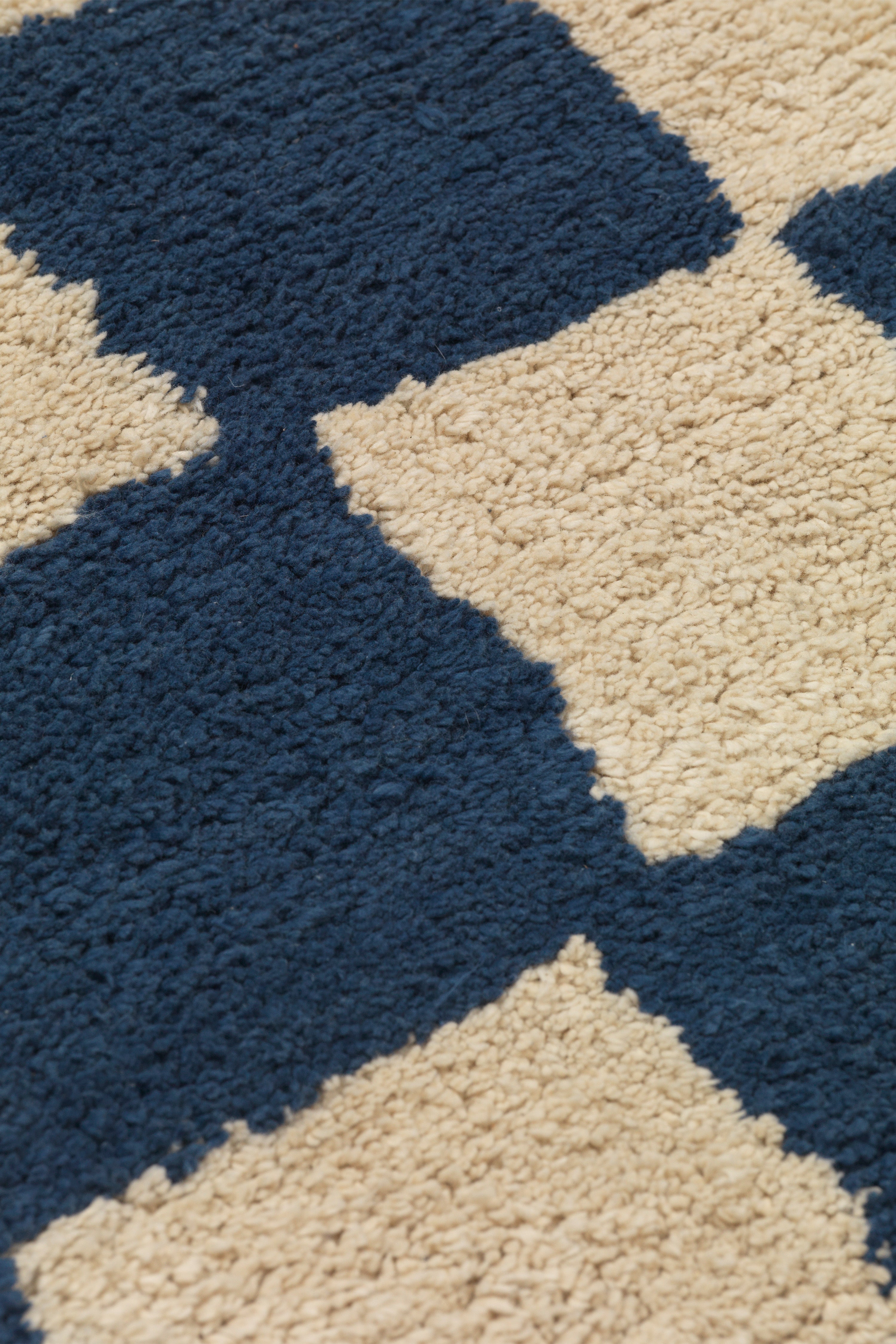 Vloerkleed MARA donkerblauw met zandkleur