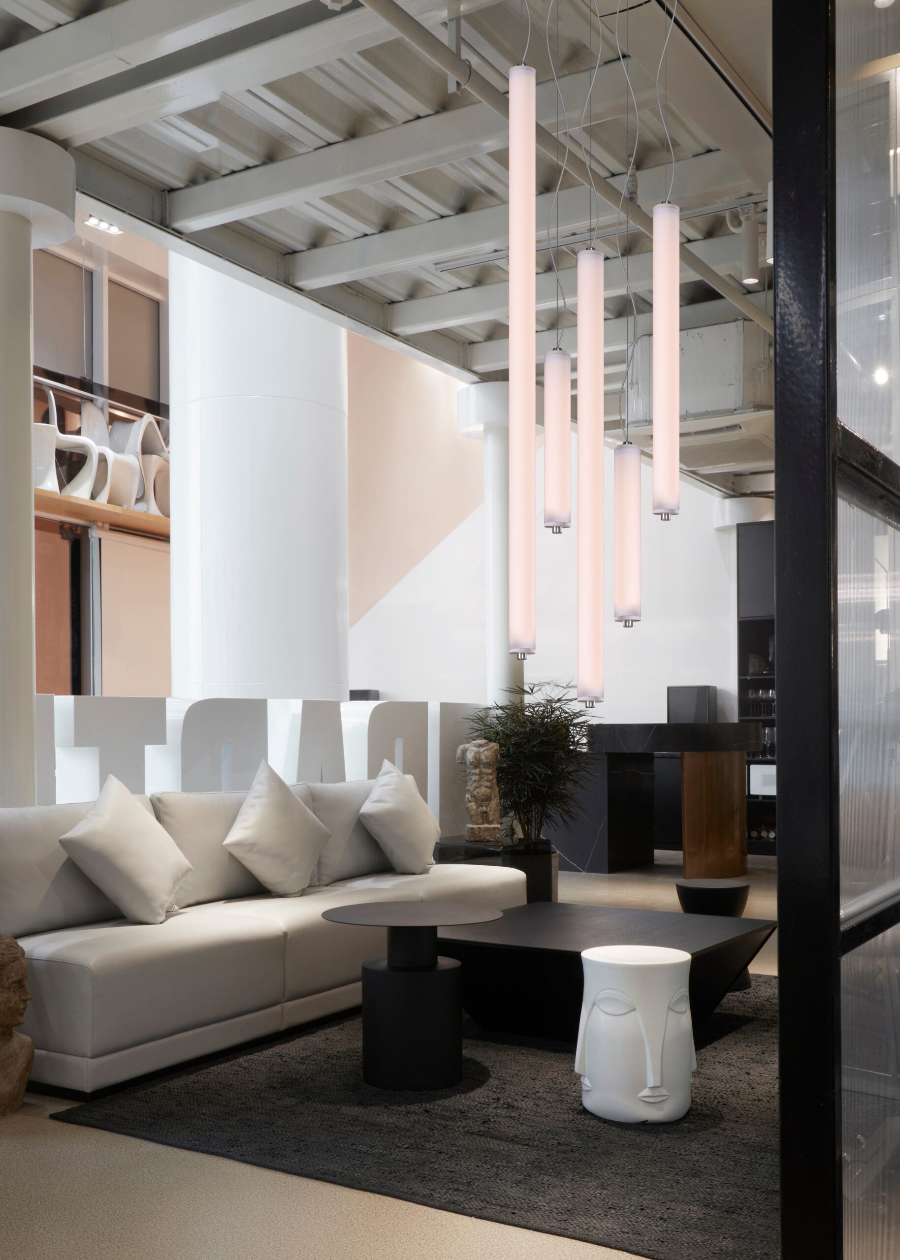 LONGA vertical pendant lamp with a milky shade and concrete detail