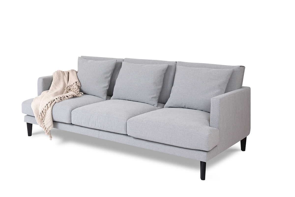 Sofa PARADISE gestoffeerd met een eiken basis