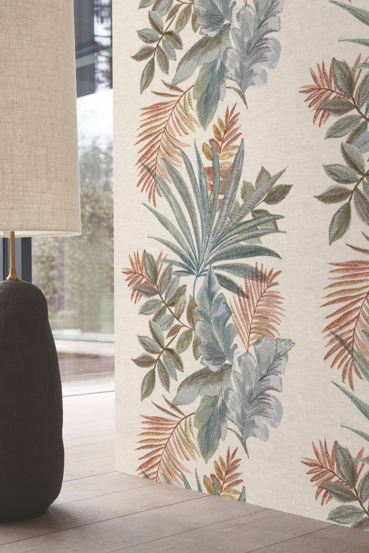 Textile wallpaper with a plant motif of leaves JARDIN EPHEMERE - EARTH OF SIENNA muted pink with green