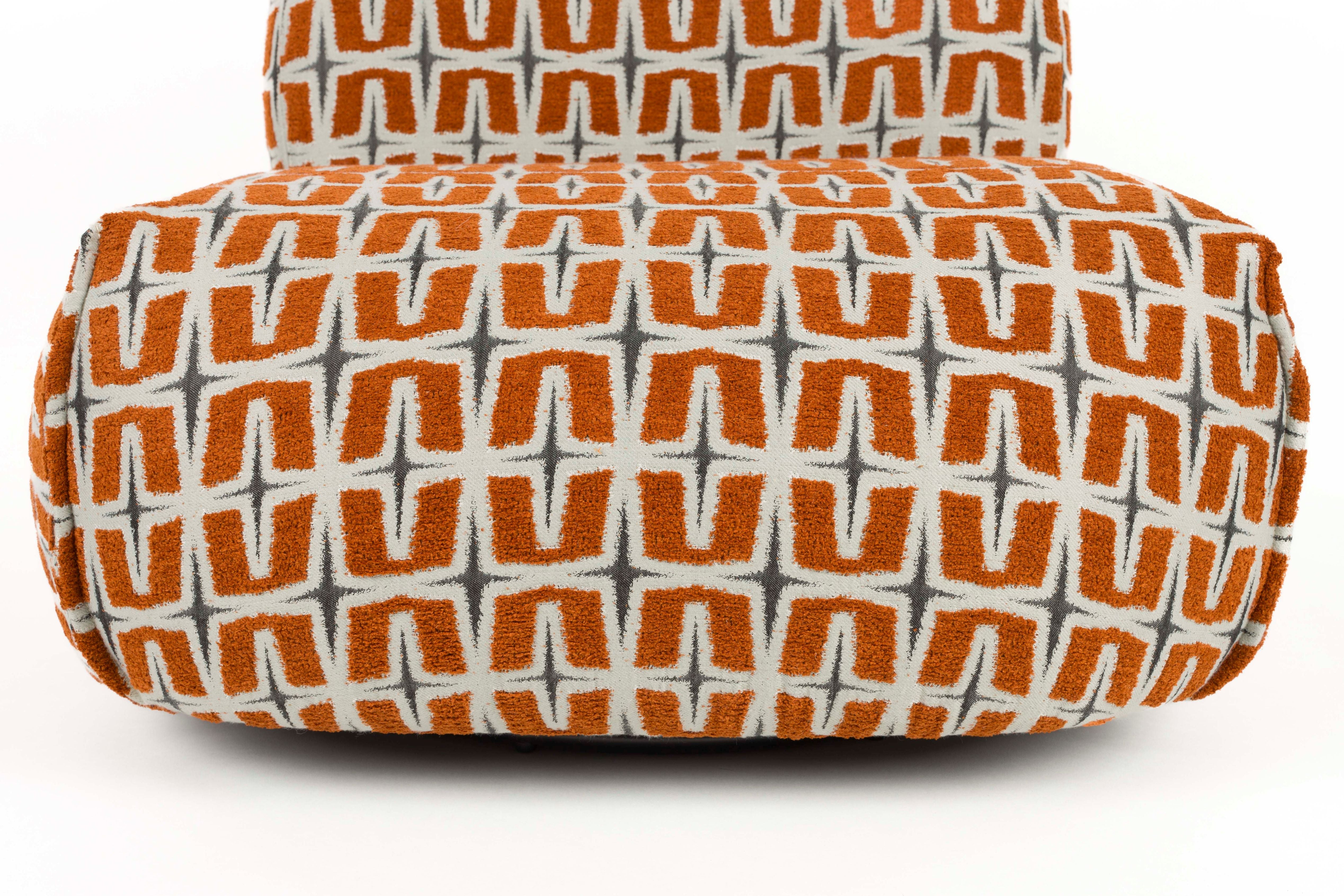 RITZ armchair in orange with geometric pattern