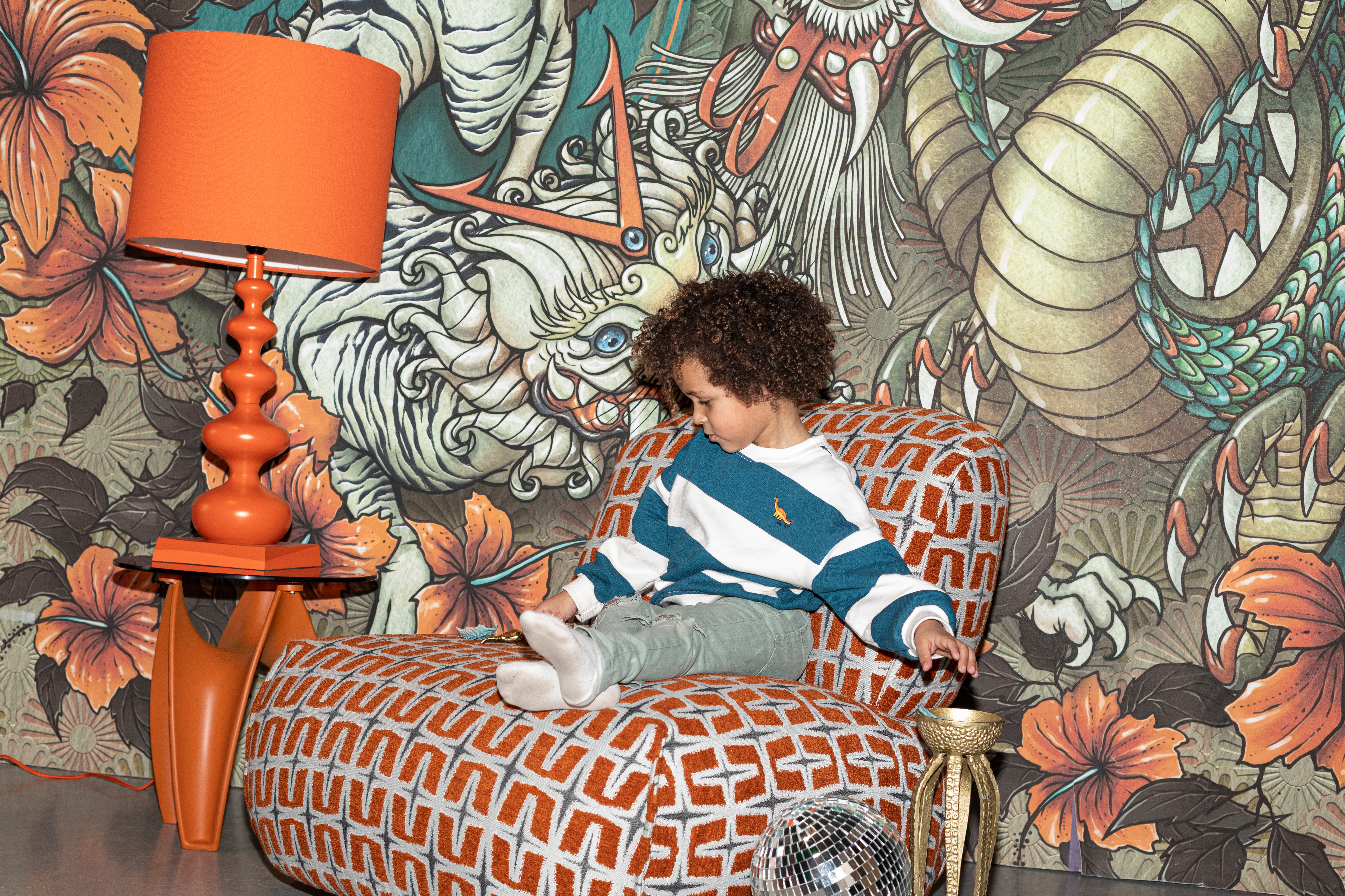 RITZ armchair in orange with geometric pattern