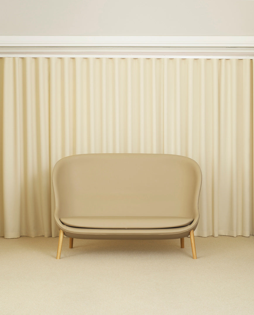 Hyg Upholstered sofa with an oak base