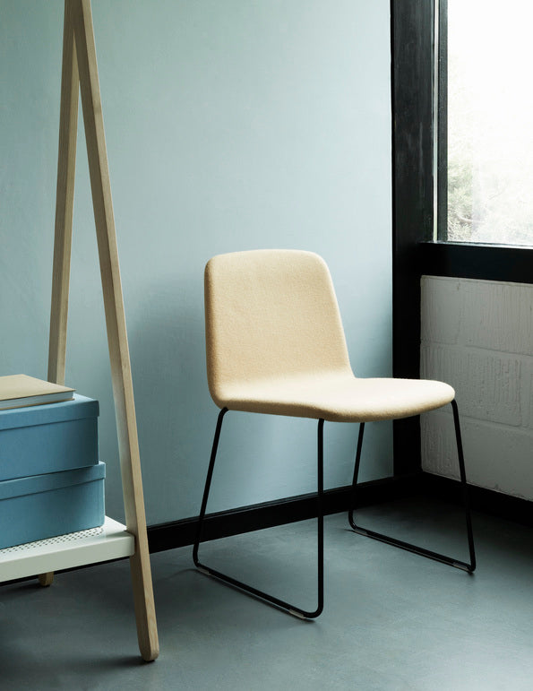 JUST Upholstered chair with a chrome base