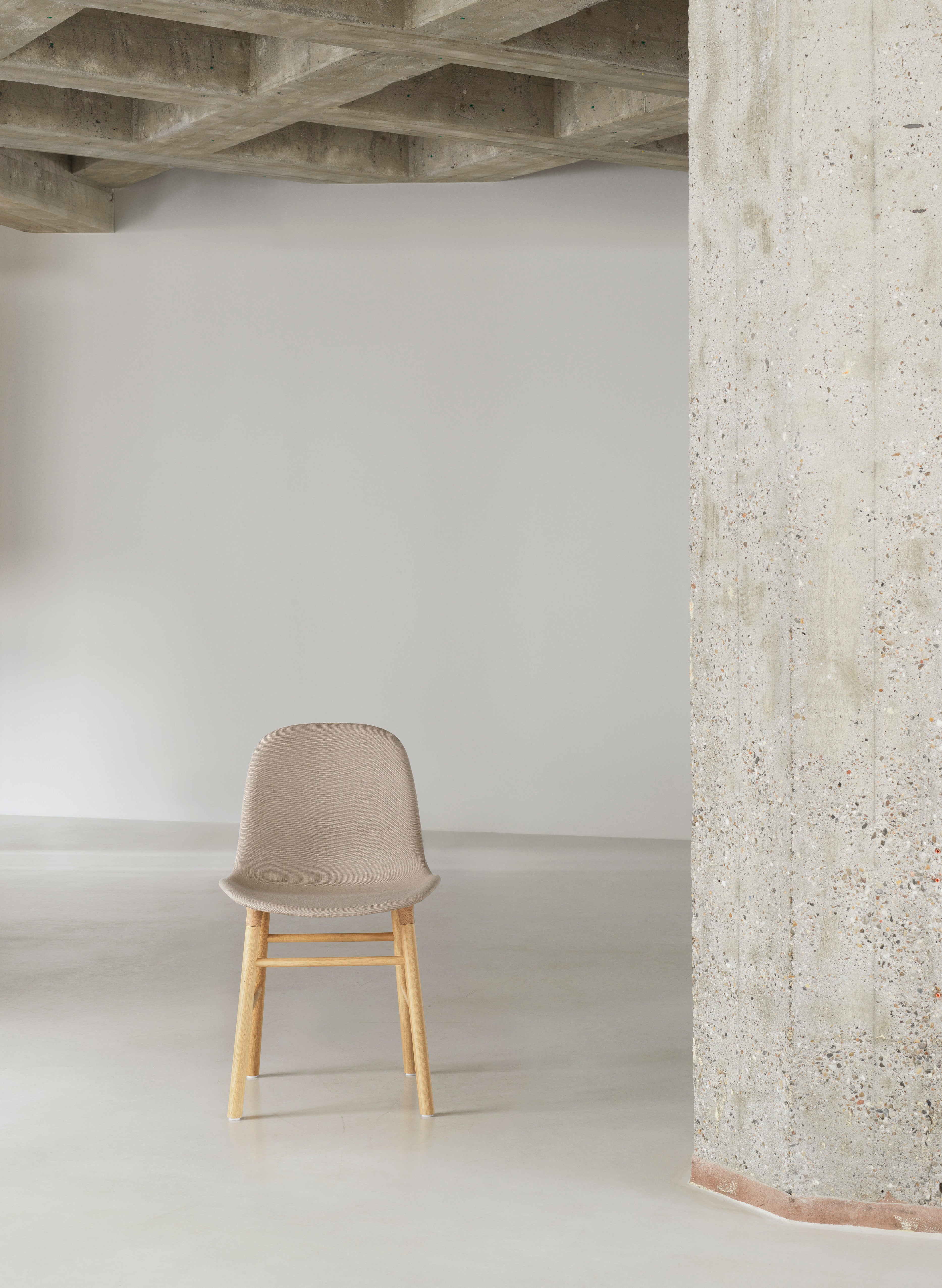 Upholstered chair forms with a nutty base