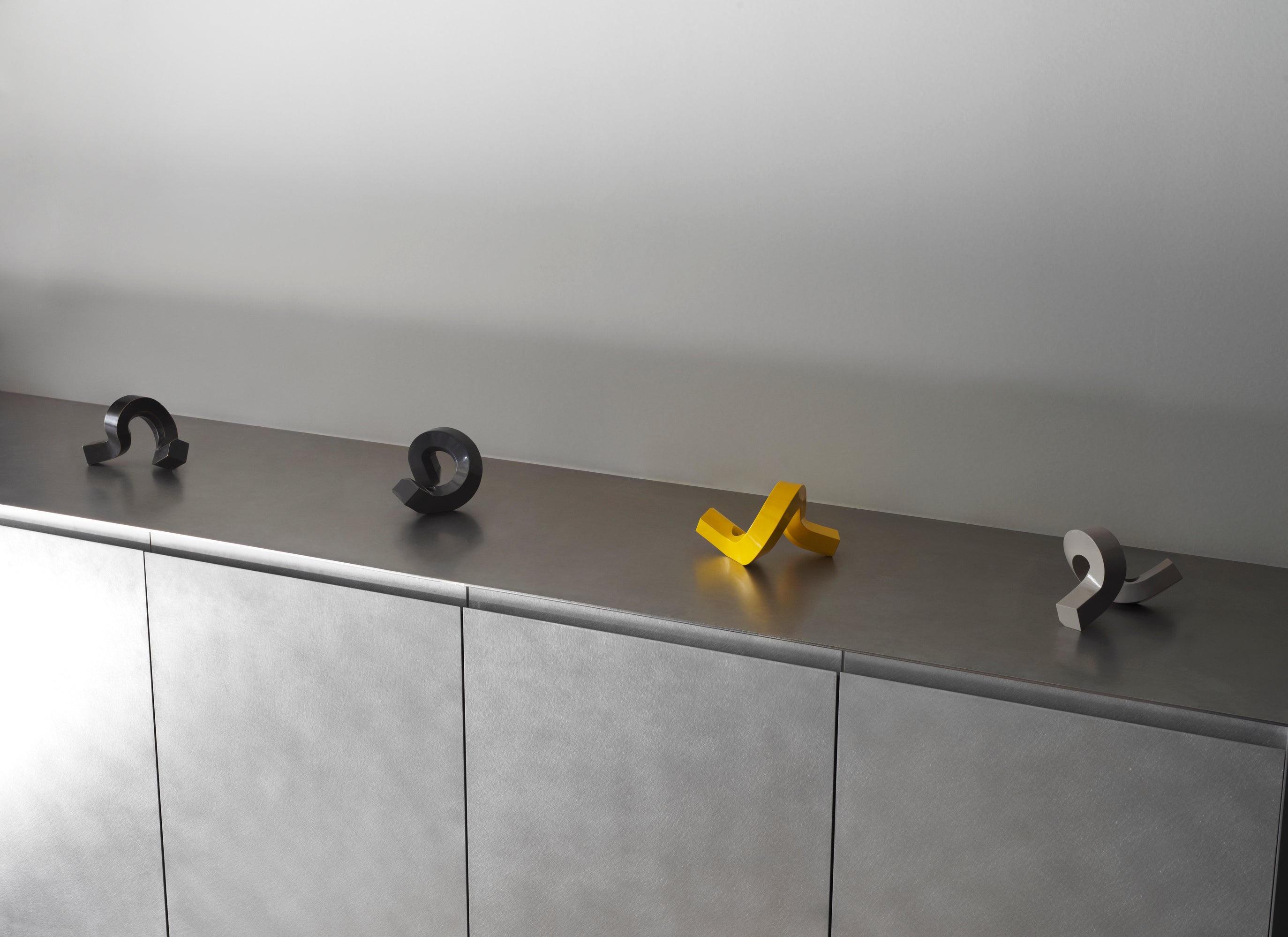 Kaarsenhouder KROMME ÉÉN geel