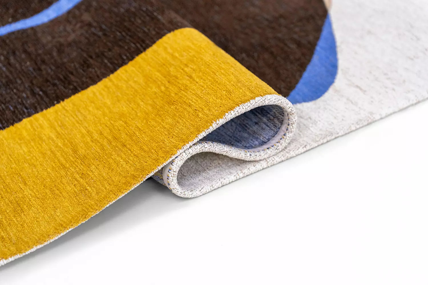 Vloerkleed STONES wit met bruin en blauw