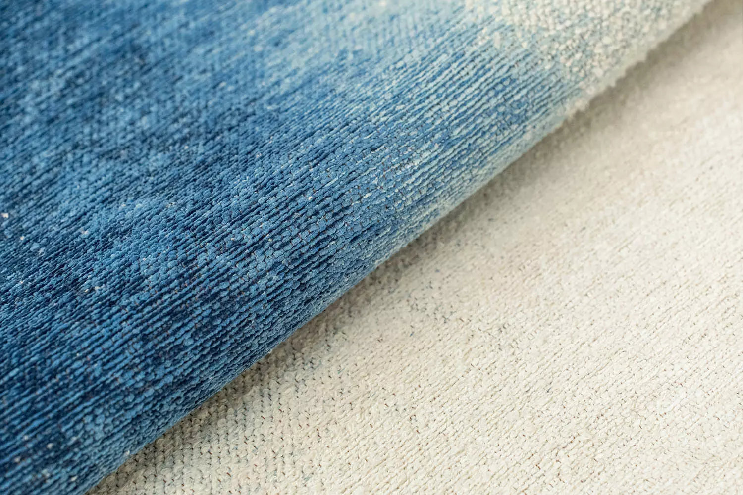 Ronde tapijt DROP wit met blauw
