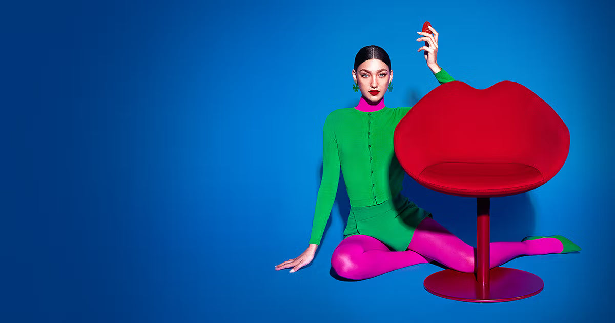 Roze leren fauteuil XOXO met ronde basis