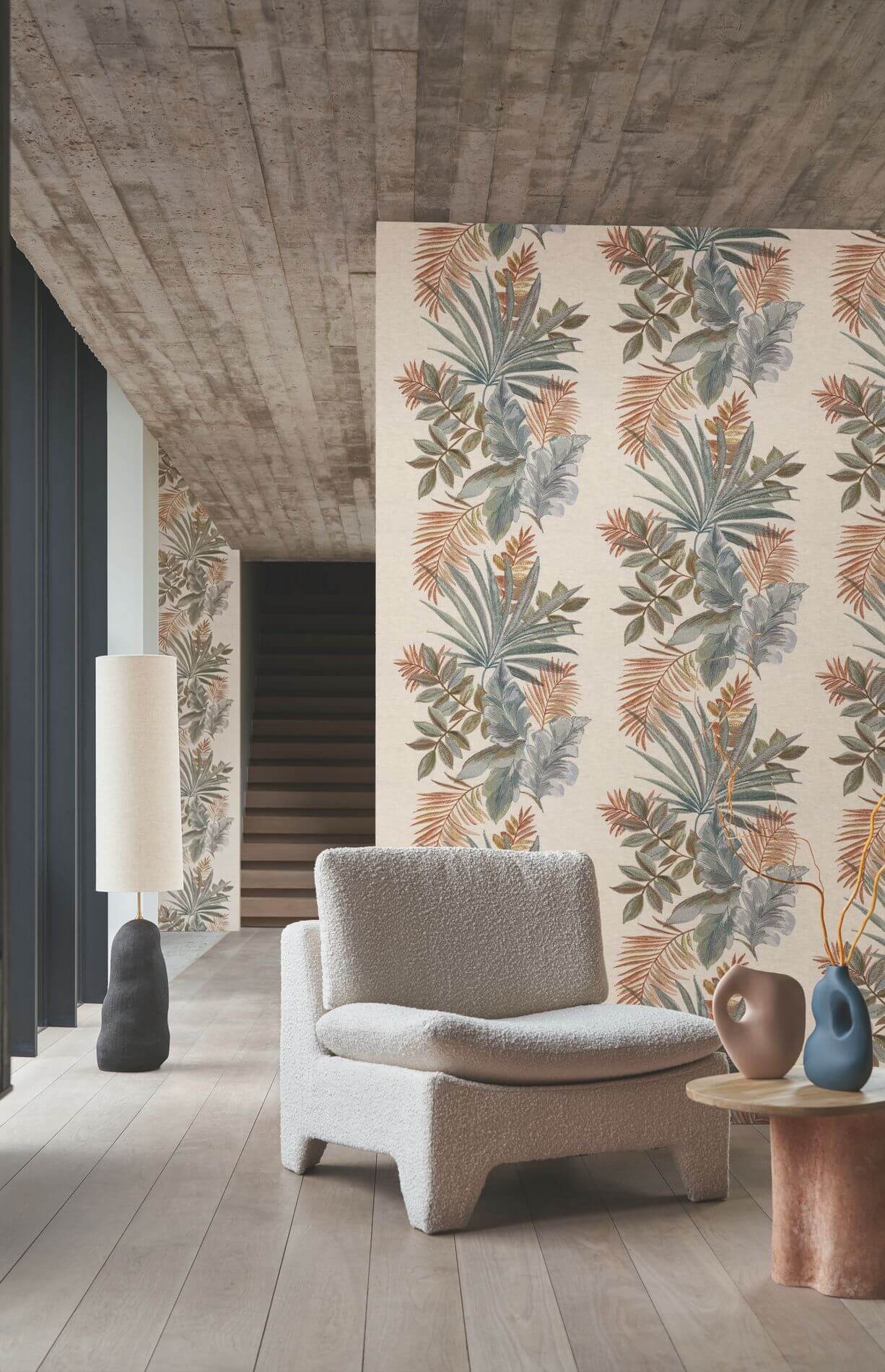 Textile wallpaper with a plant motif of leaves JARDIN EPHEMERE - EARTH OF SIENNA muted pink with green