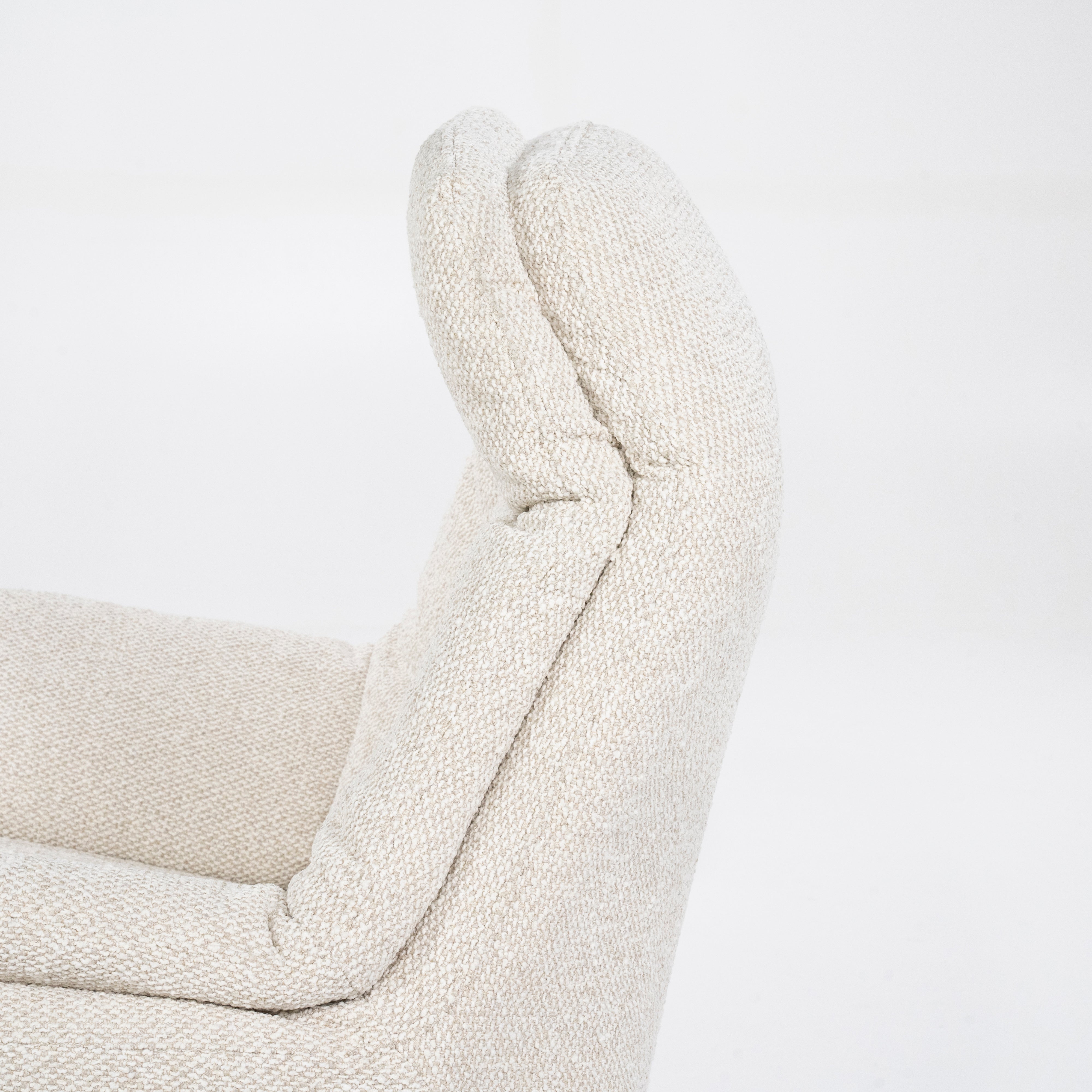 CALEB beige armchair with black base and footrest