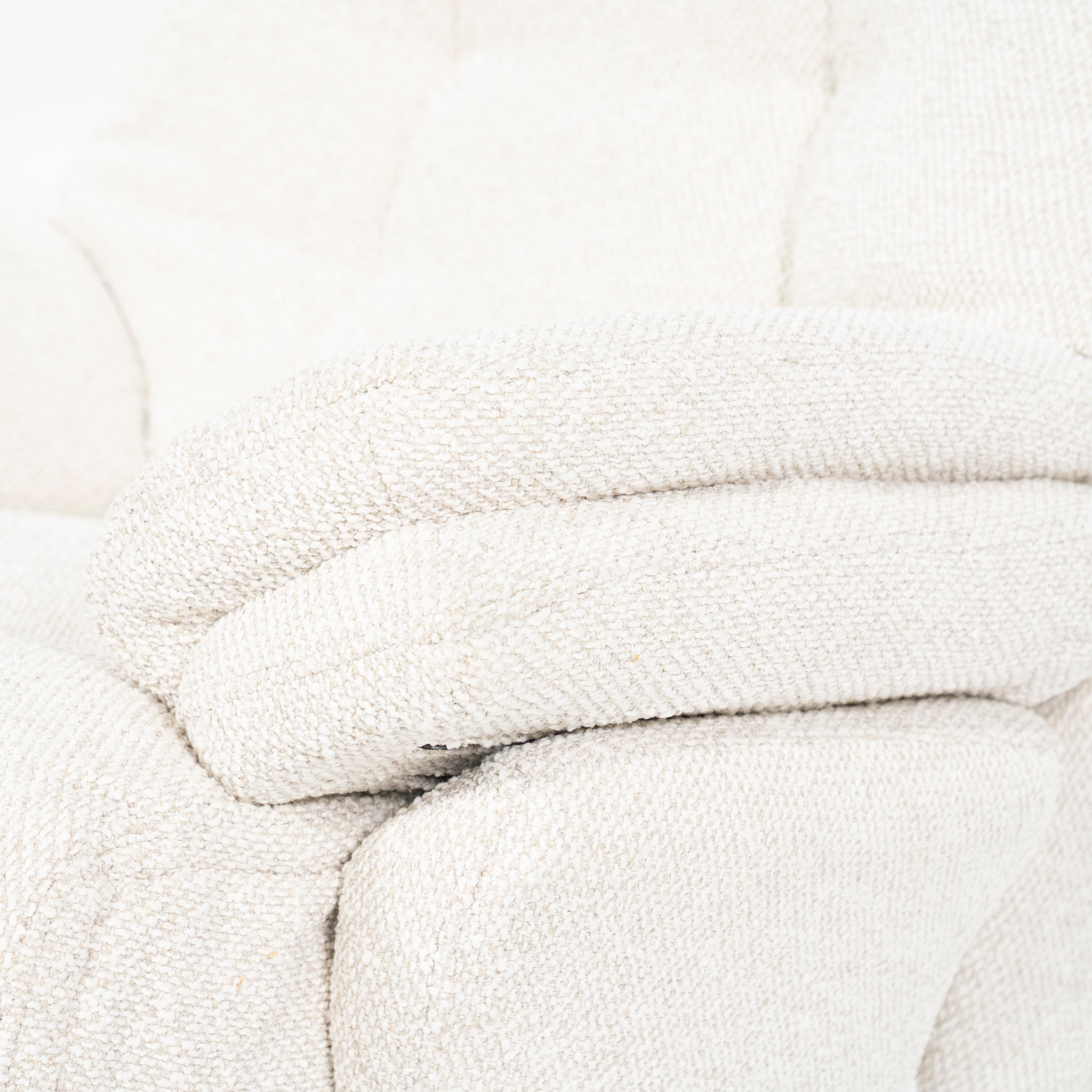 CALEB beige armchair with black base and footrest