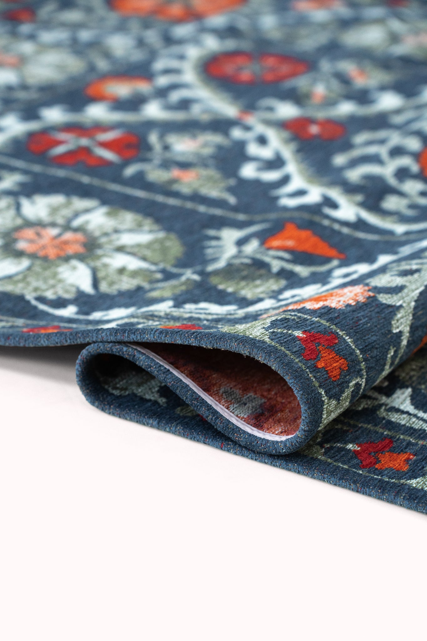 Vloerkleed SUZANI NORDIC blauw met grijs en oranje