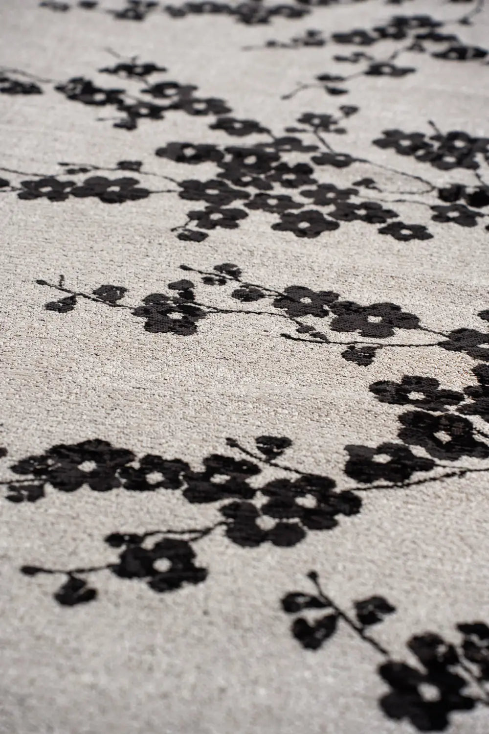 Ovale tapijt SAKURA wit met zwart