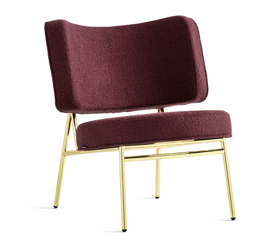 Upholstered COCO armchair with a golden base