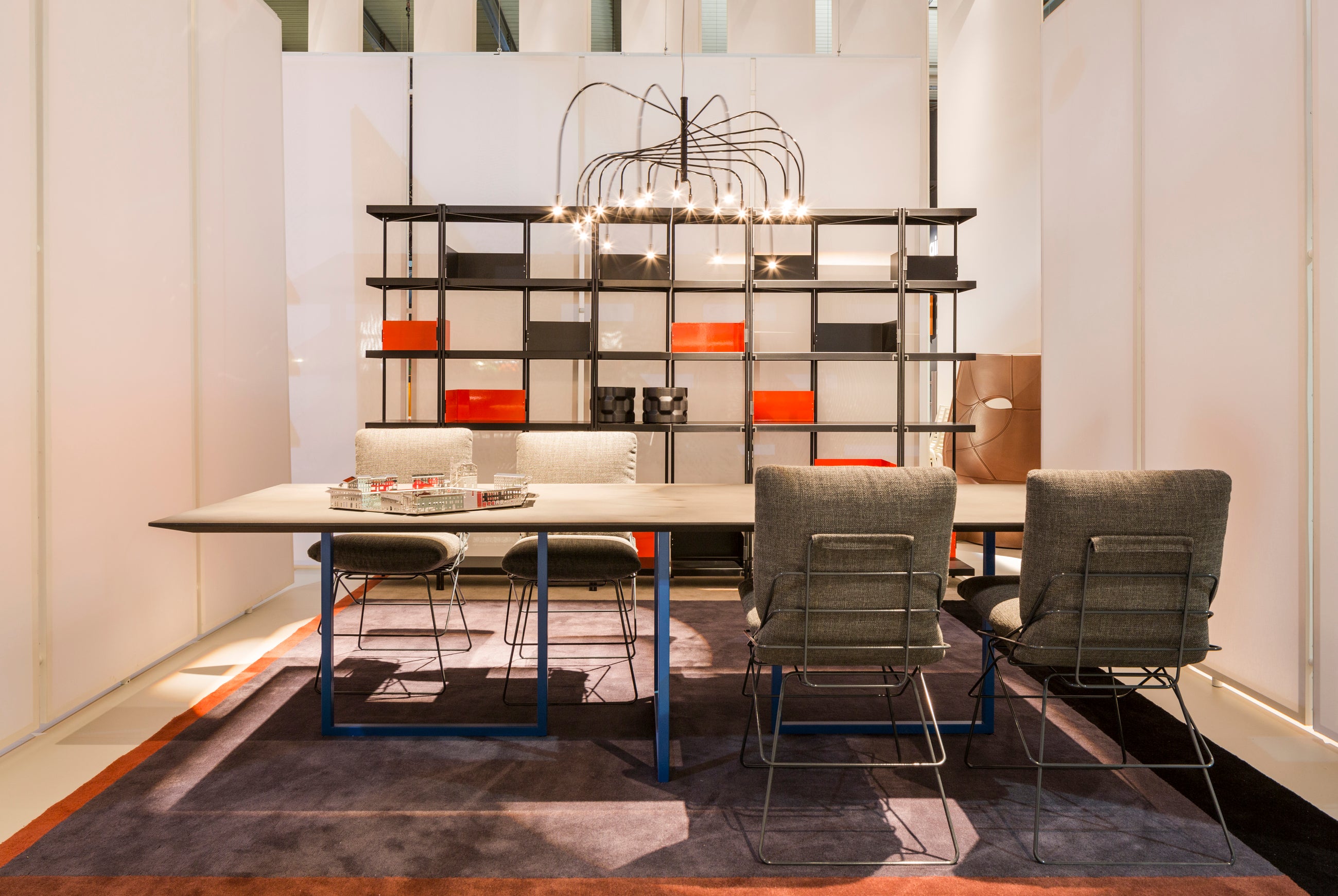 Gazelle table black top with a red base