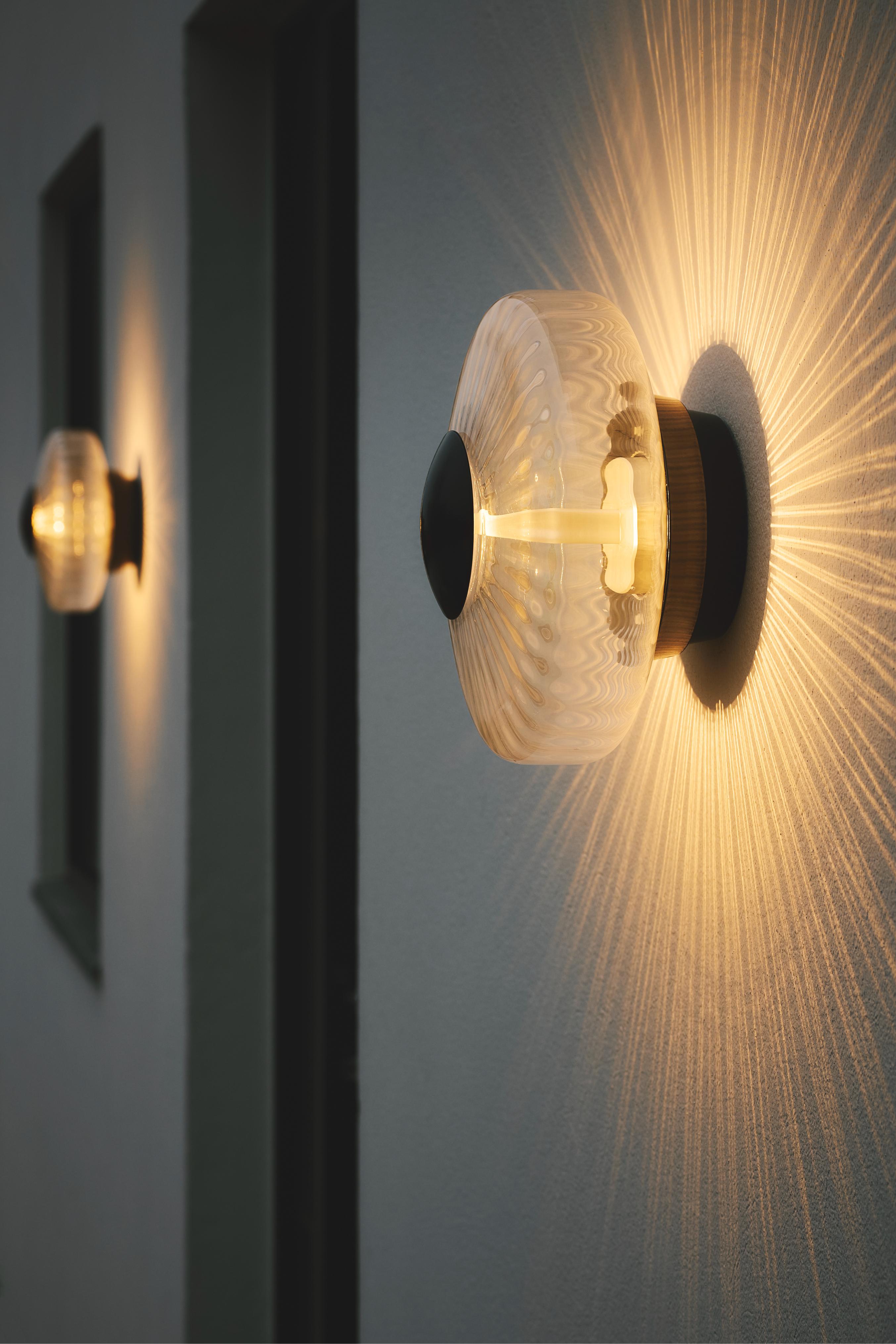 Buitenwandlamp NEW WAVE OPTIC transparant met zwarte afwerking