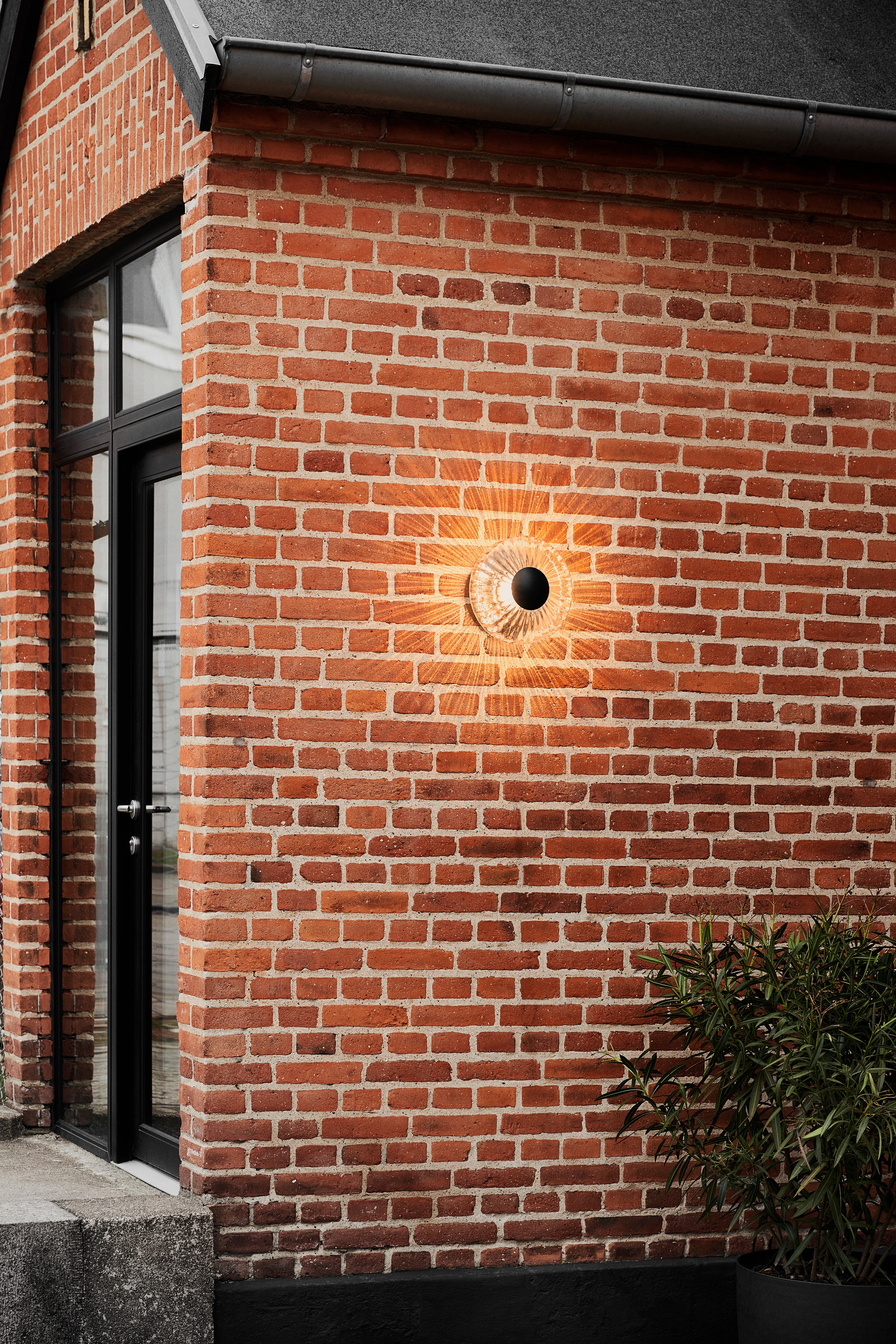 Buitenwandlamp NEW WAVE OPTIC transparant met zwarte afwerking