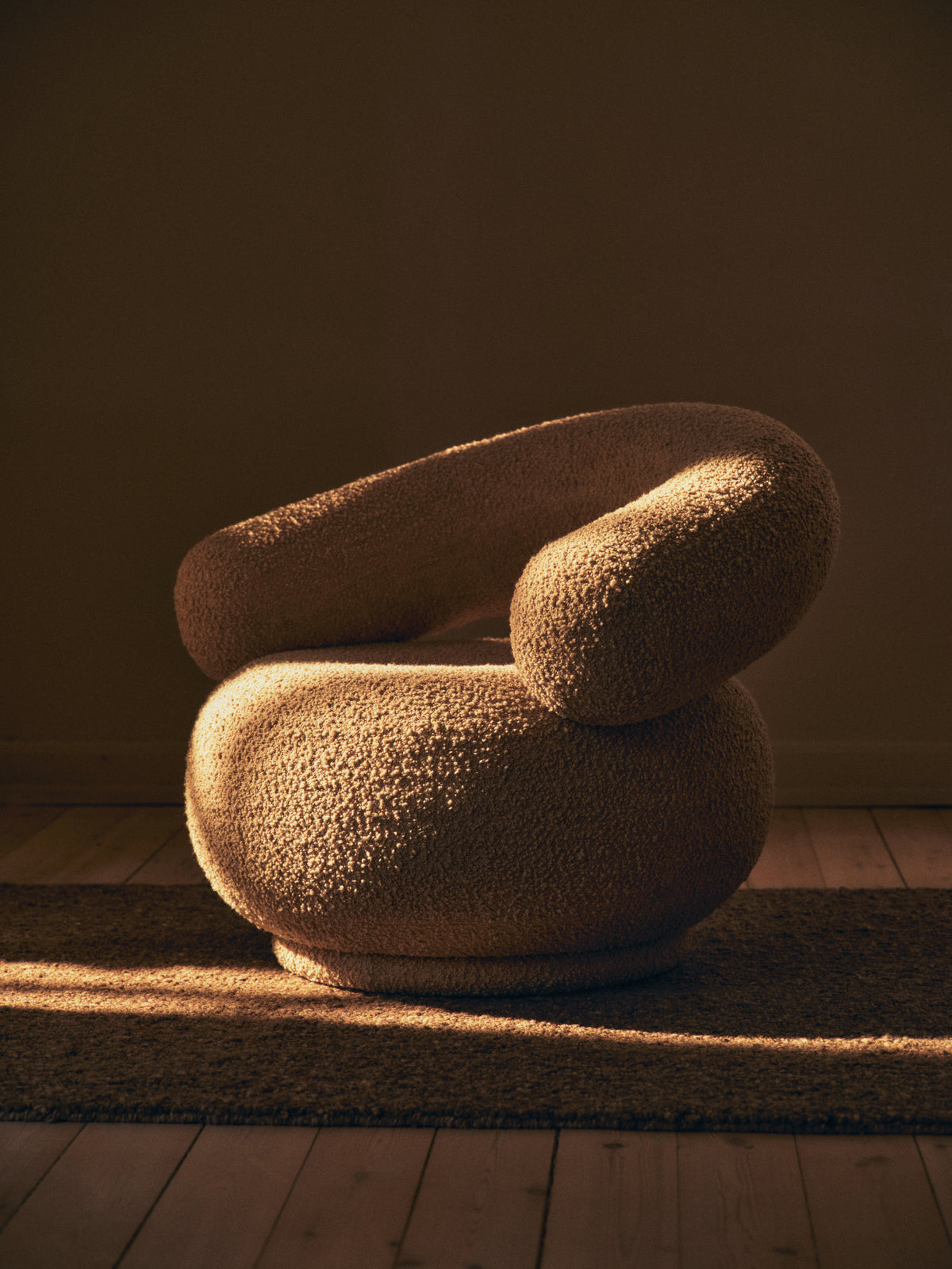 Draaifauteuil ORBO koffie boucle