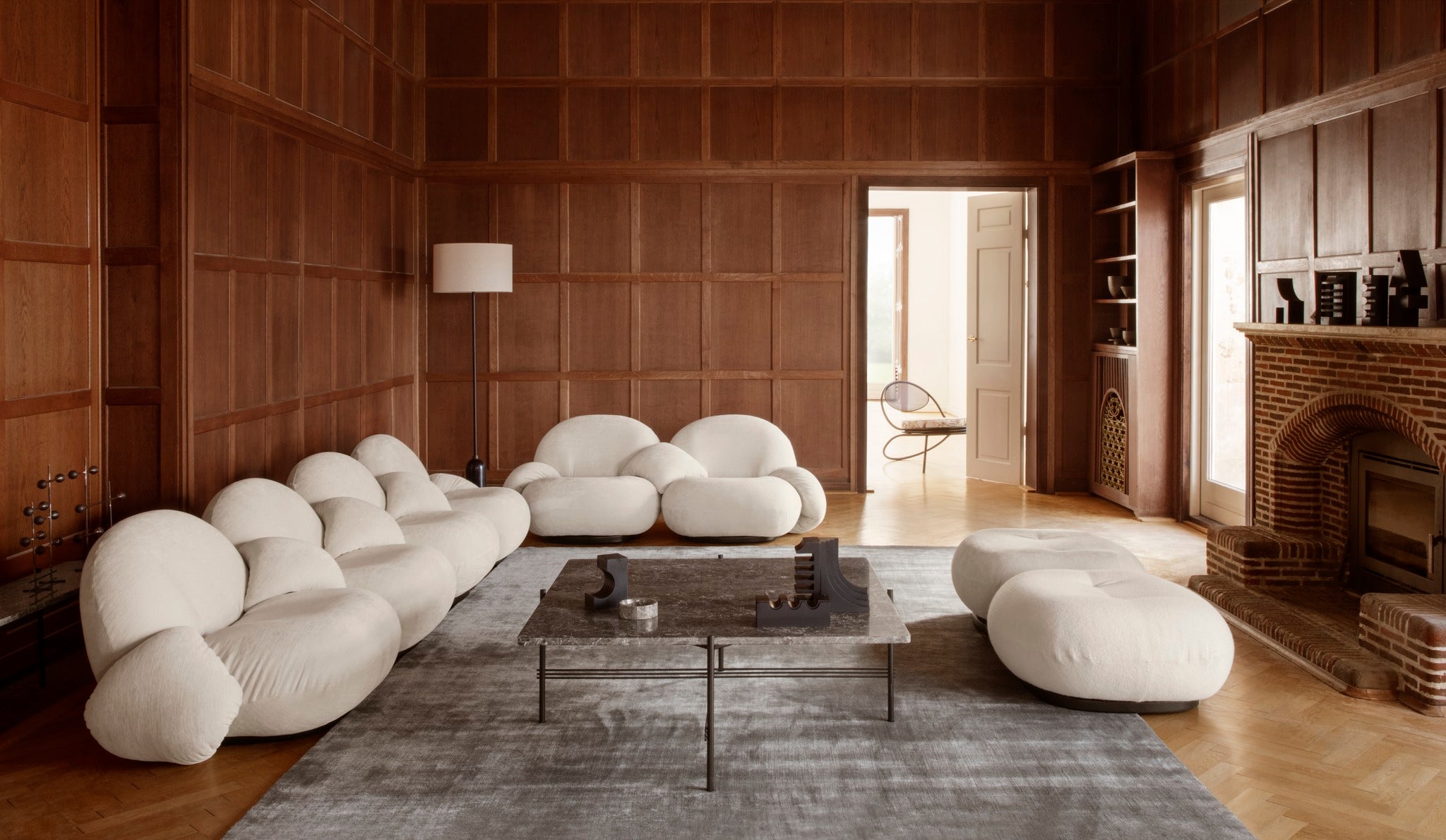 COPACABANA armchair upholstered with an orange base