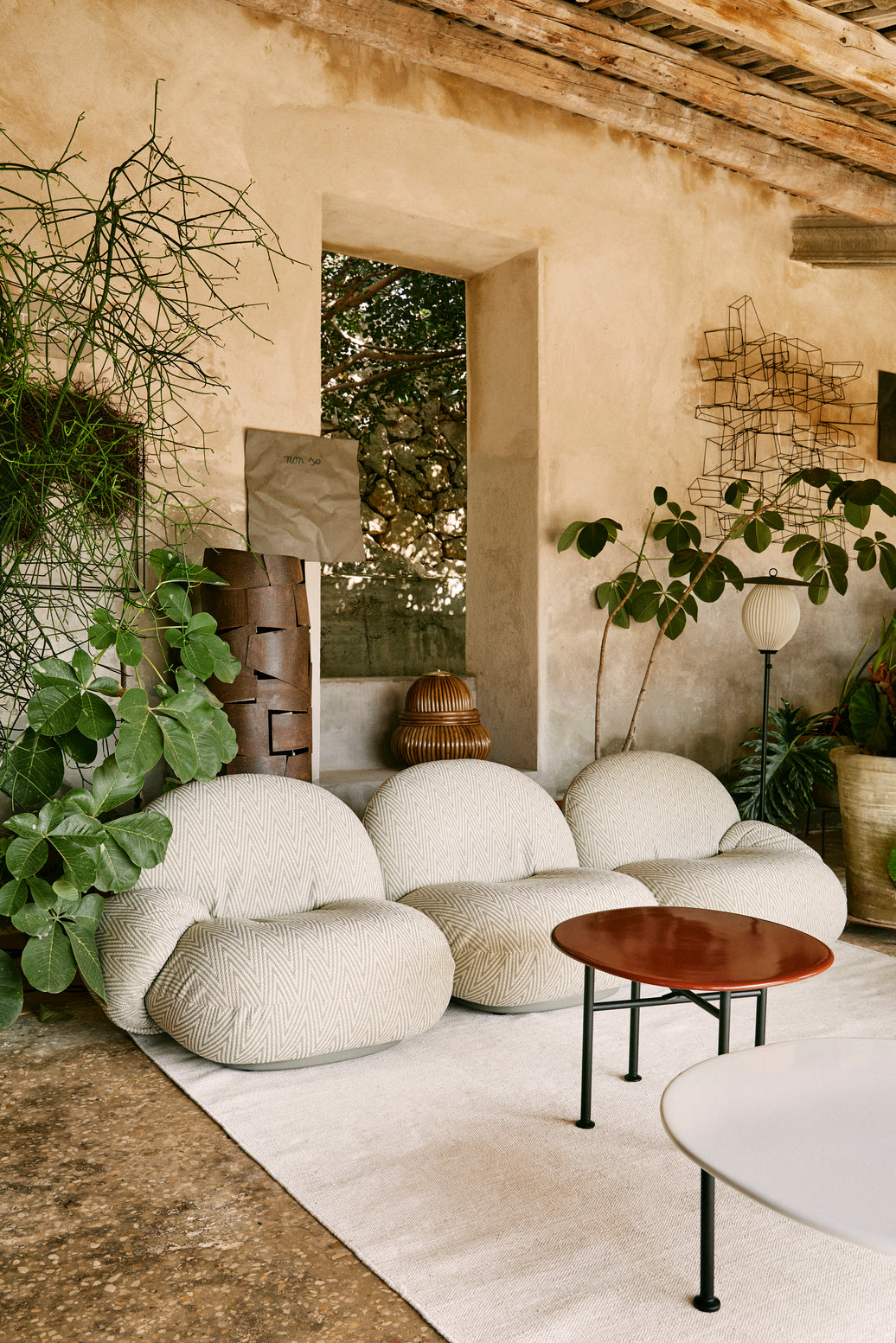 PACHA upholstered outdoor armchair with a gold base