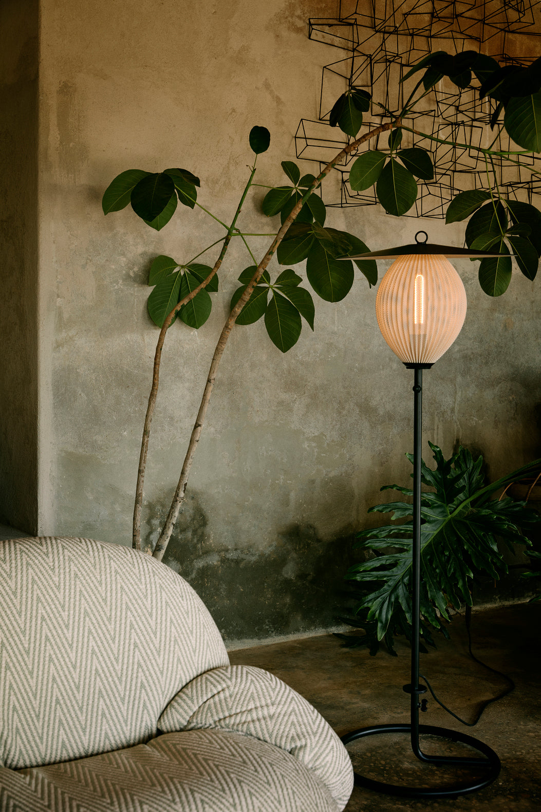 PACHA upholstered outdoor armchair with a gold base