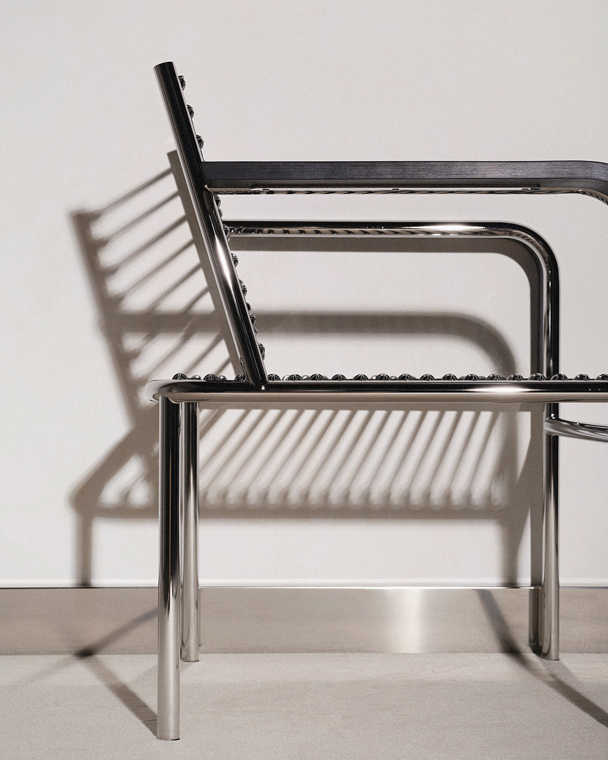 Zwarte SANDOWS fauteuil met stalen basis