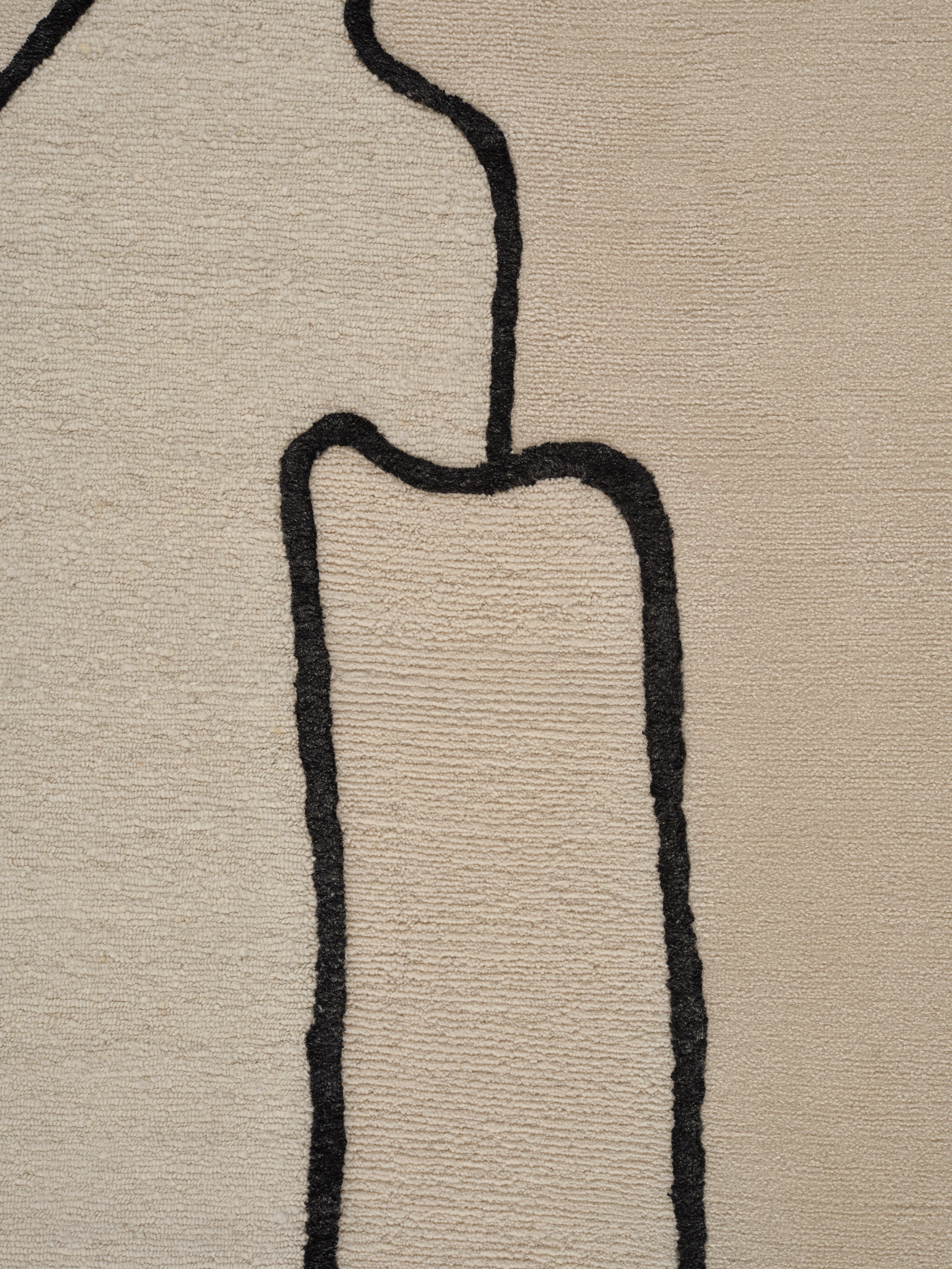 SELF MIRAGE beige rug with black