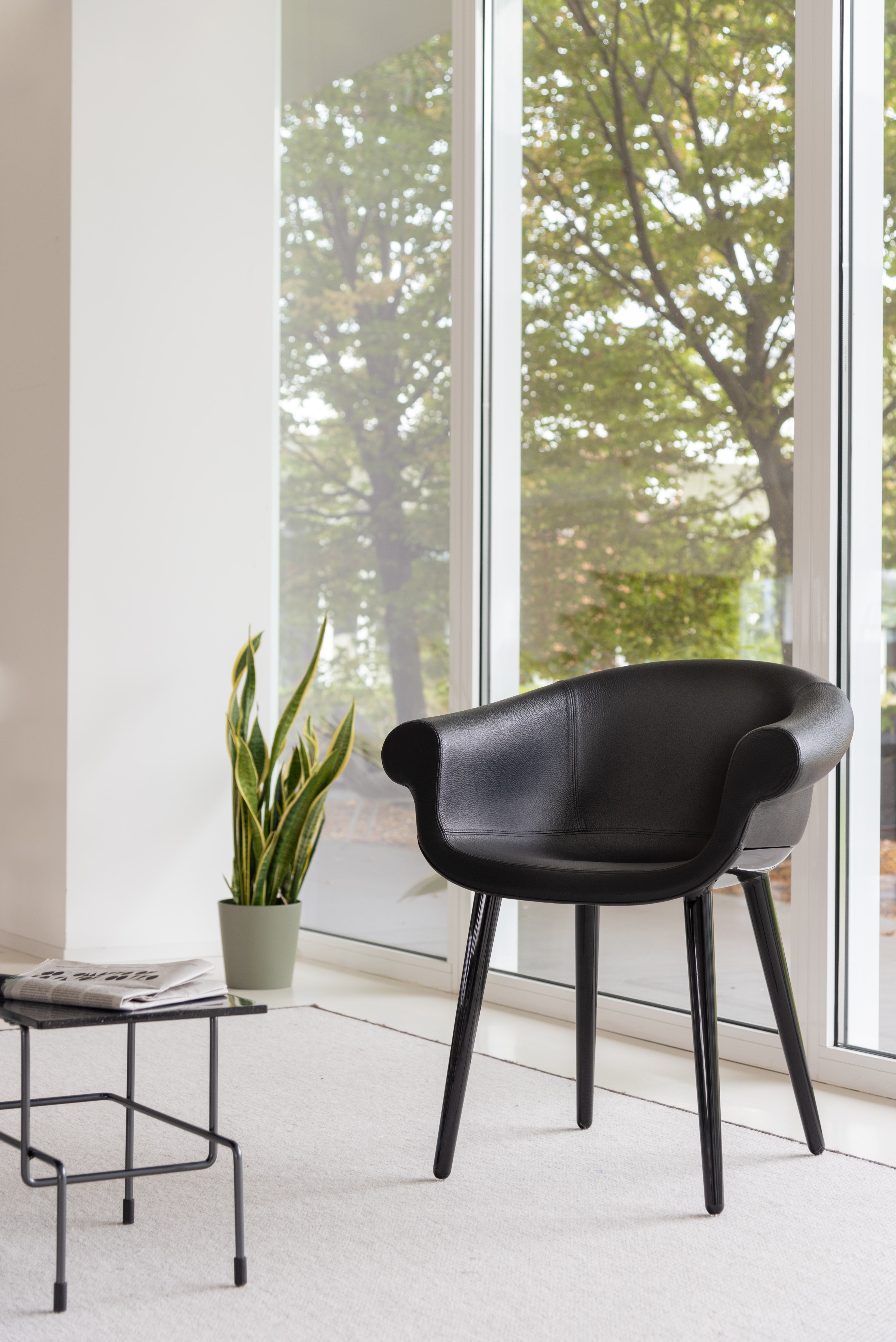 CYBORG LORD chair in sea green with a white base