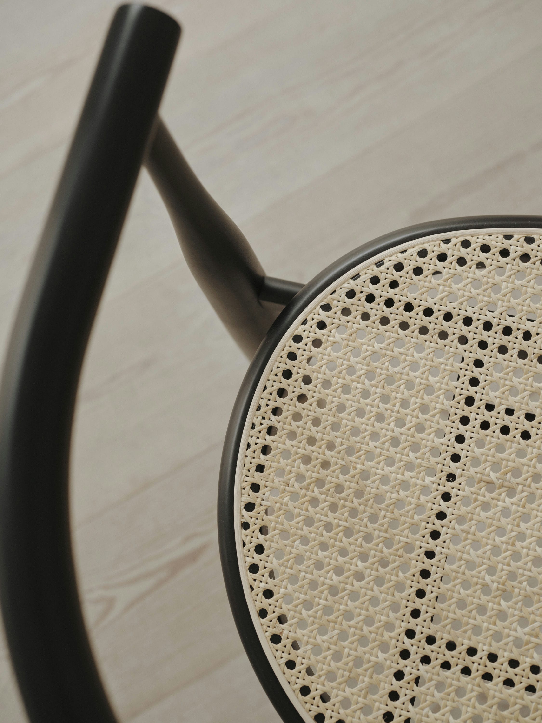 Bukowski chair braided seat with a black beech base