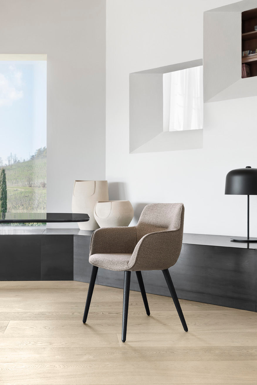 IGLOO upholstered chair with a dark wooden base