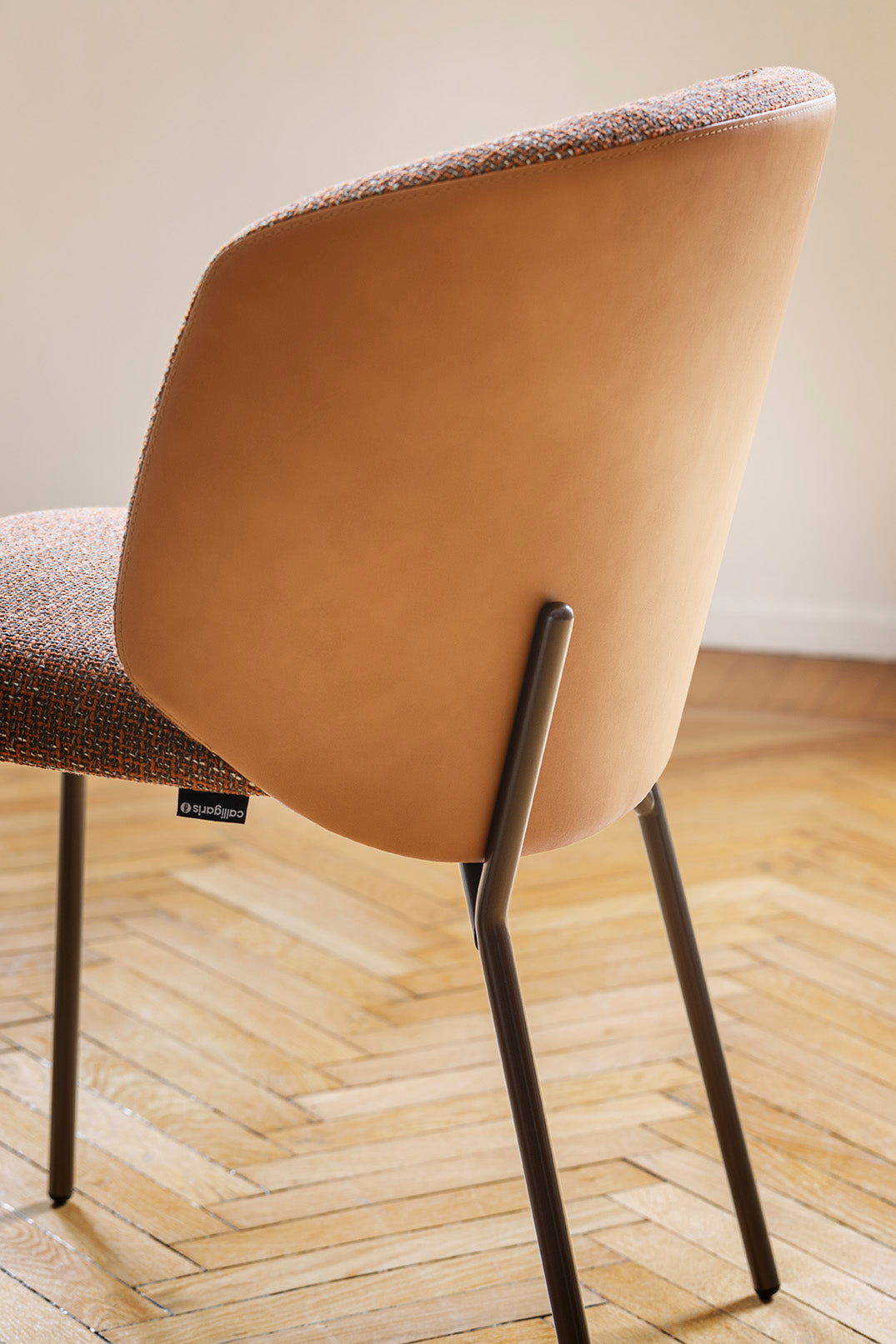 SWEEL upholstered chair with black metal base