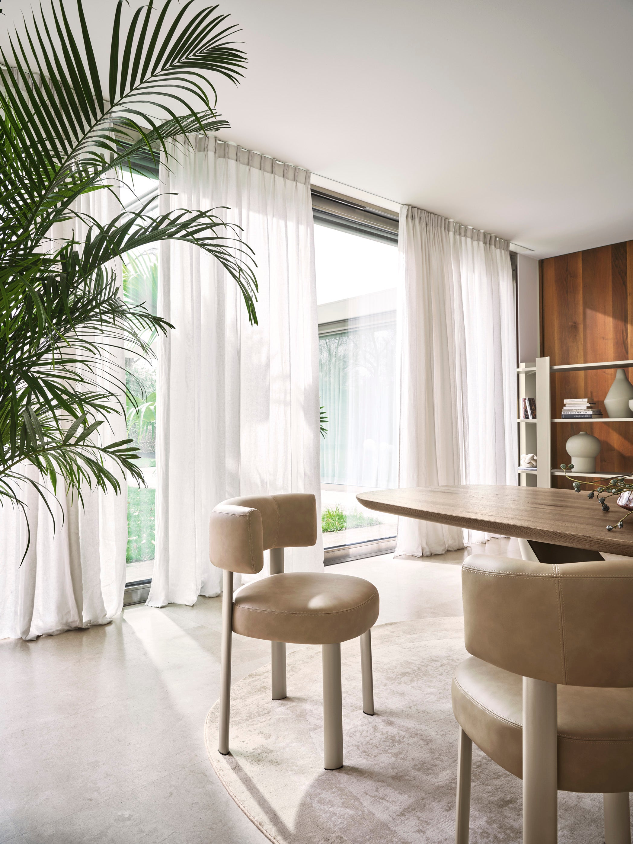 Upholstered GLEN chair with a brown base