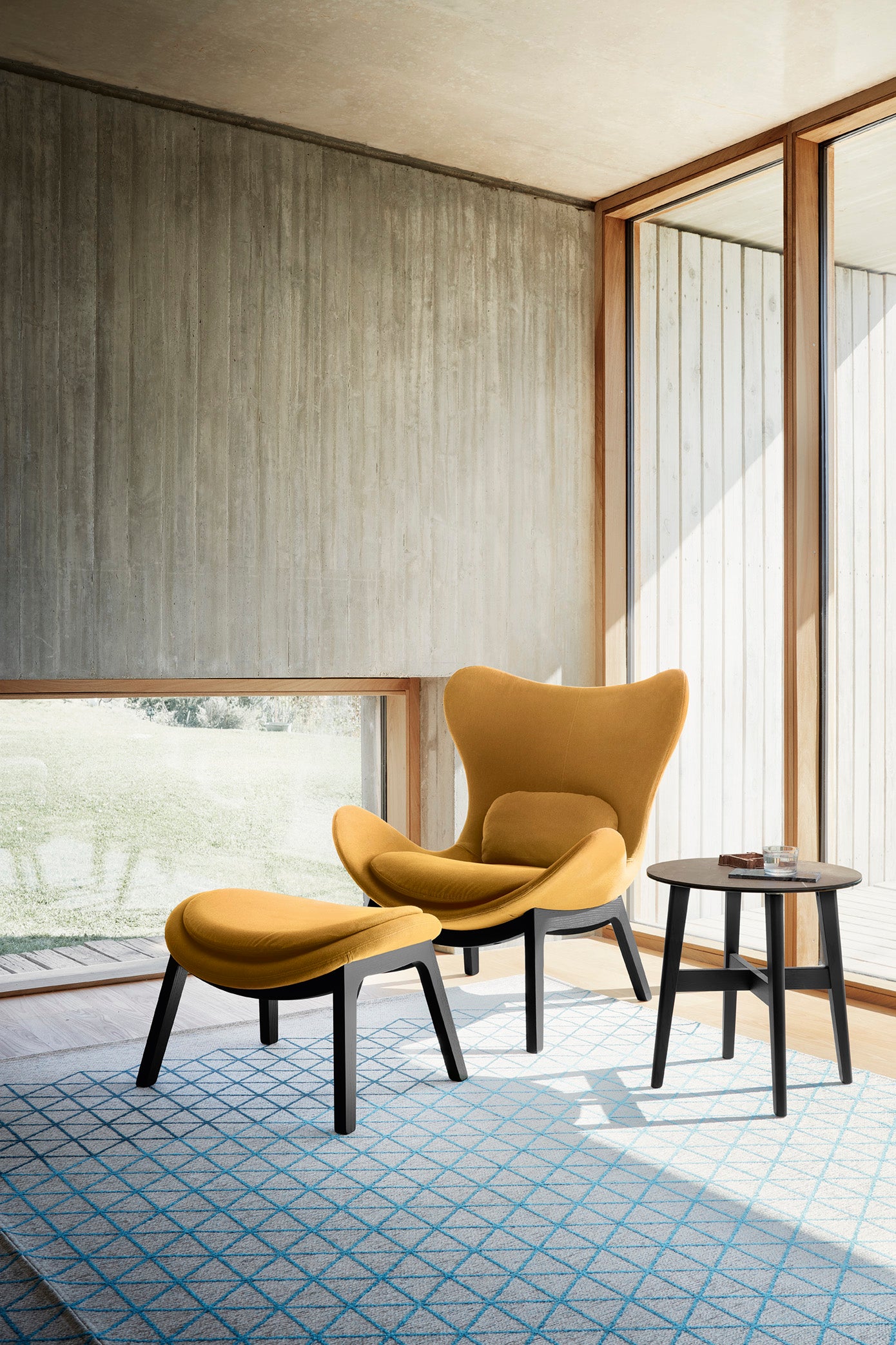 Upholstered LAZY Armchair with Black Wooden Base