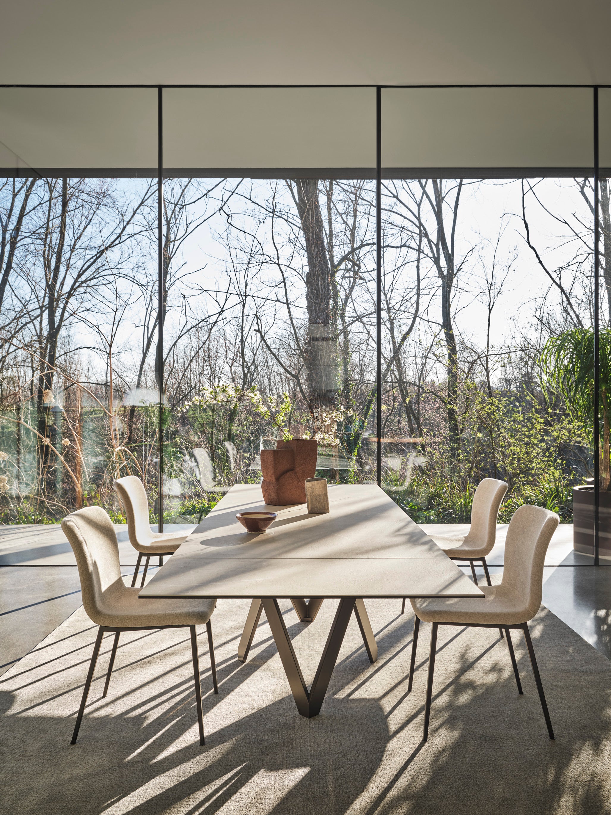 ANNIE upholstered chair with a brown metal base