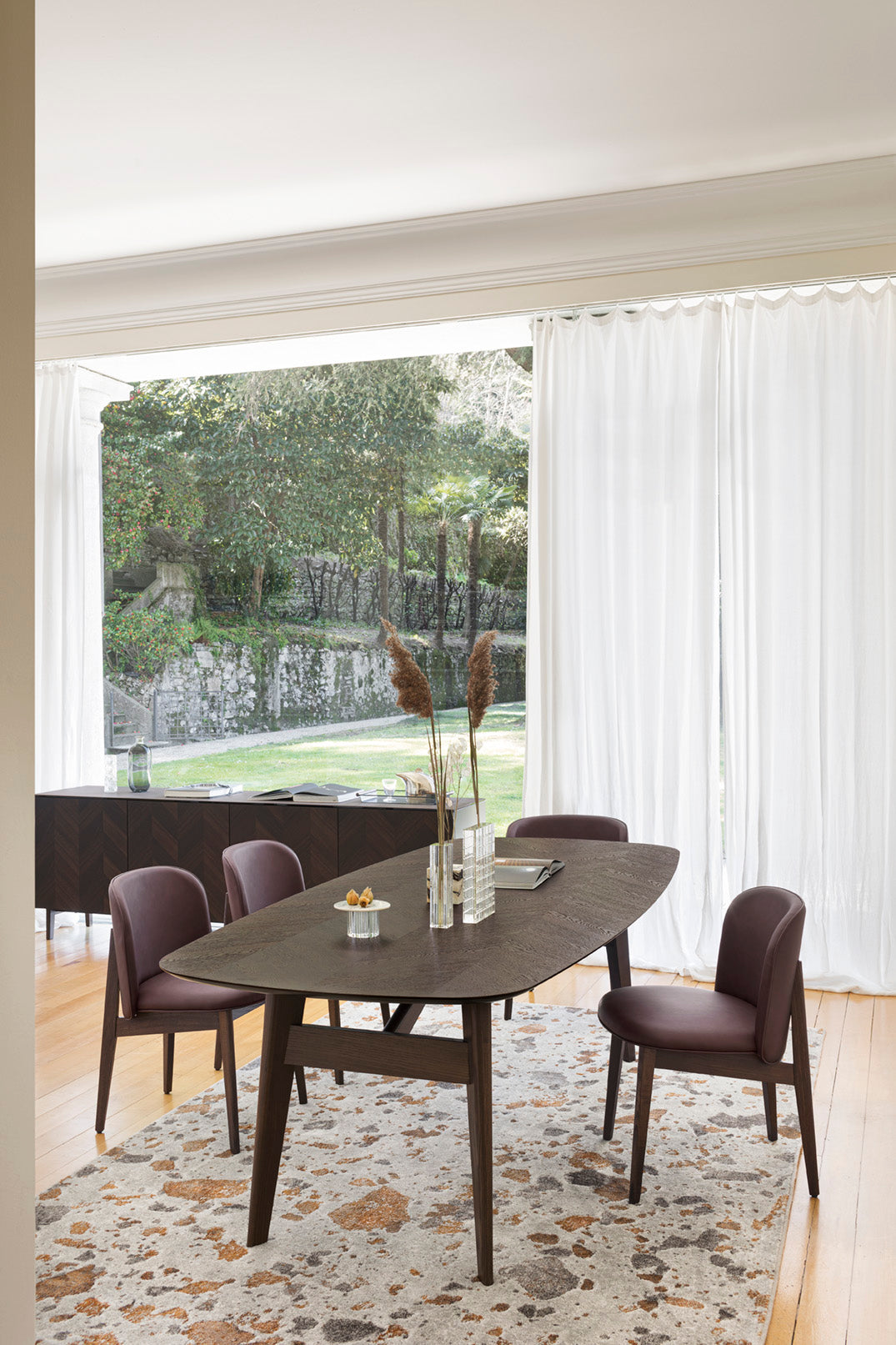 Armchair ABREY upholstered with a black wooden base